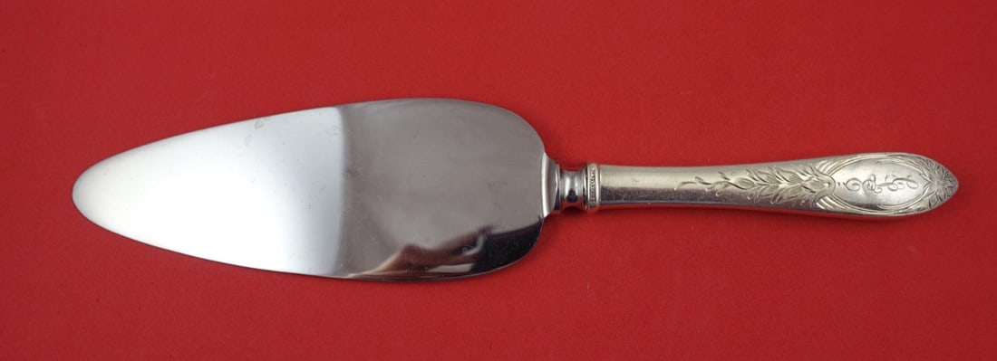 Kirk Primrose Sterling Silver Cake Server 10.5 Inch: Kirk Primrose Sterling Silver Cake Server 10.5 Inch Introducing the exquisite Primrose Cake Server by Kirk, a beautiful addition to your dining collection. This server features a hollow handle crafted