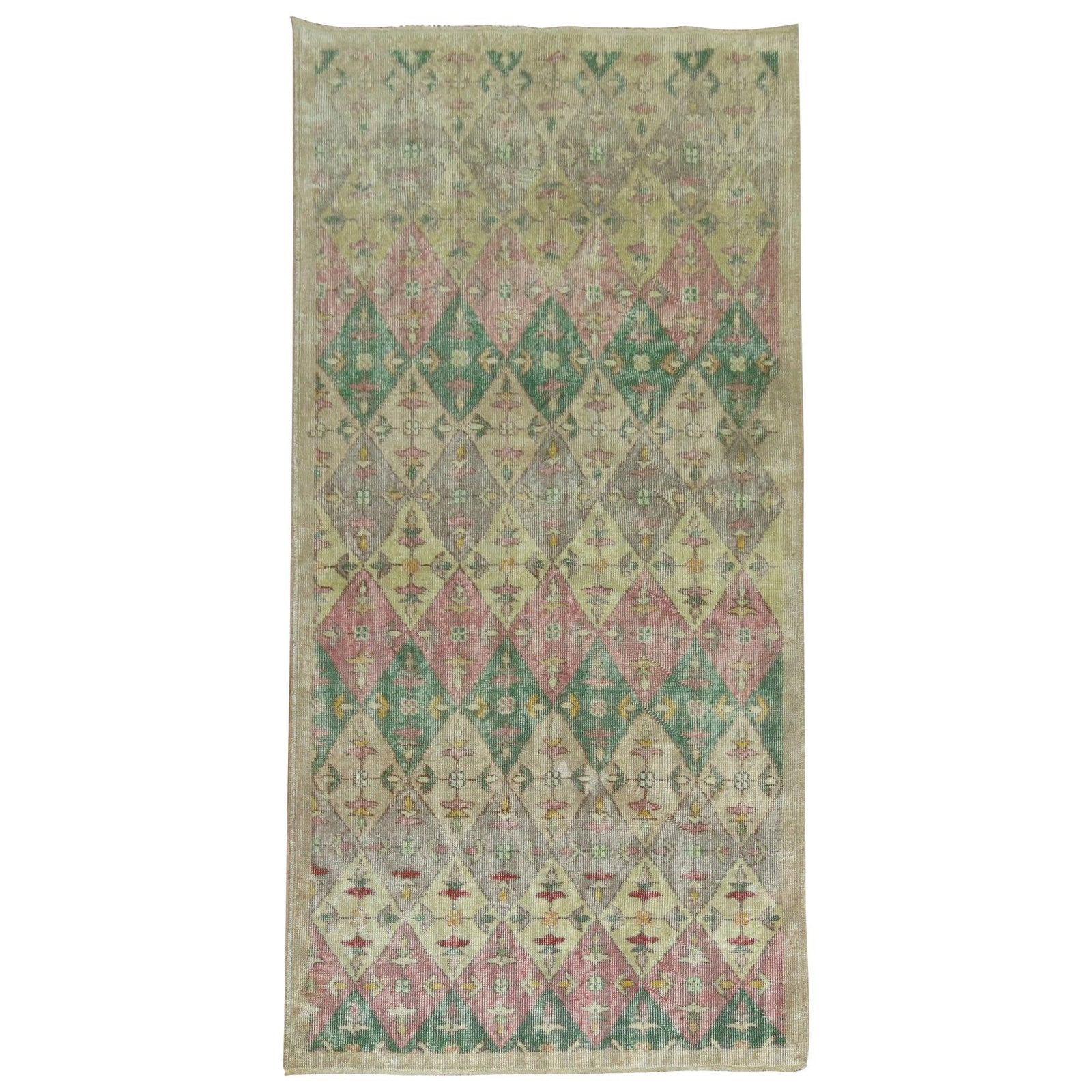 20th Century Turkish Wool Hand-Knotted Runner Pink Green Accents: 20th Century Turkish Wool Hand-Knotted Runner Pink Green Accents This vintage Anatolian runner from the 20th century features a hand-knotted wool construction and showcases a repetitive diamond motif 