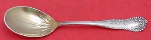 Gorham Lancaster Sterling Silver Ice Cream Spoon Gold Washed 5 3/8": Gorham Lancaster Sterling Silver Ice Cream Spoon Gold Washed 5 3/8" This exquisite ice cream spoon, featuring the elegant Lancaster pattern by Gorham, is crafted from high-quality sterling silver and 