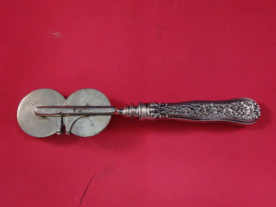 Tiffany & Co Olympian Sterling Silver Knife Sharpener 8 1/4 Vintage: Tiffany & Co Olympian Sterling Silver Knife Sharpener 8 1/4 Vintage This stunning knife sharpener features the iconic Olympian pattern by Tiffany & Co., crafted from high-quality sterling silver. Meas
