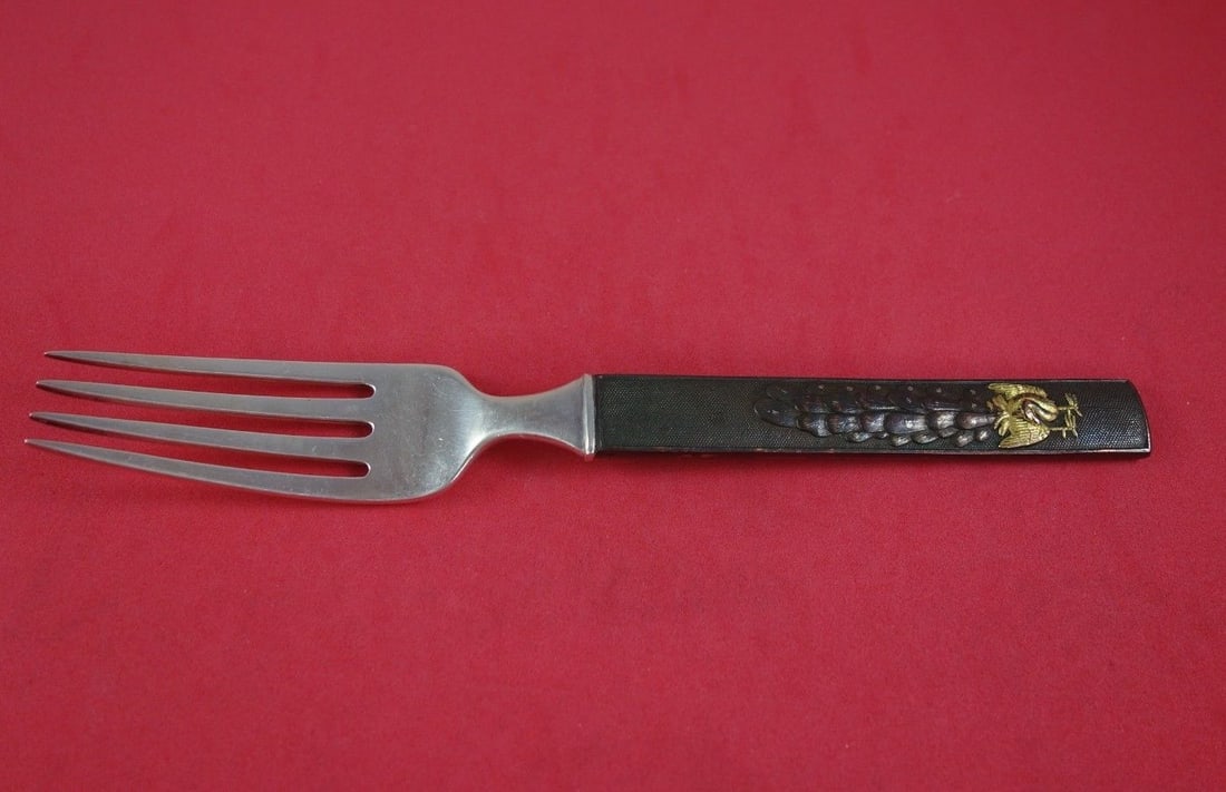 Tiffany & Co Kozuka Dinner Fork Sterling Copper Bronze 7 3/8 Inches: Tiffany & Co Kozuka Dinner Fork Sterling Copper Bronze 7 3/8 Inches Elevate your dining experience with this exquisite dinner fork from the renowned Kozuka pattern by Tiffany & Co. Measuring 7 3/8 inc