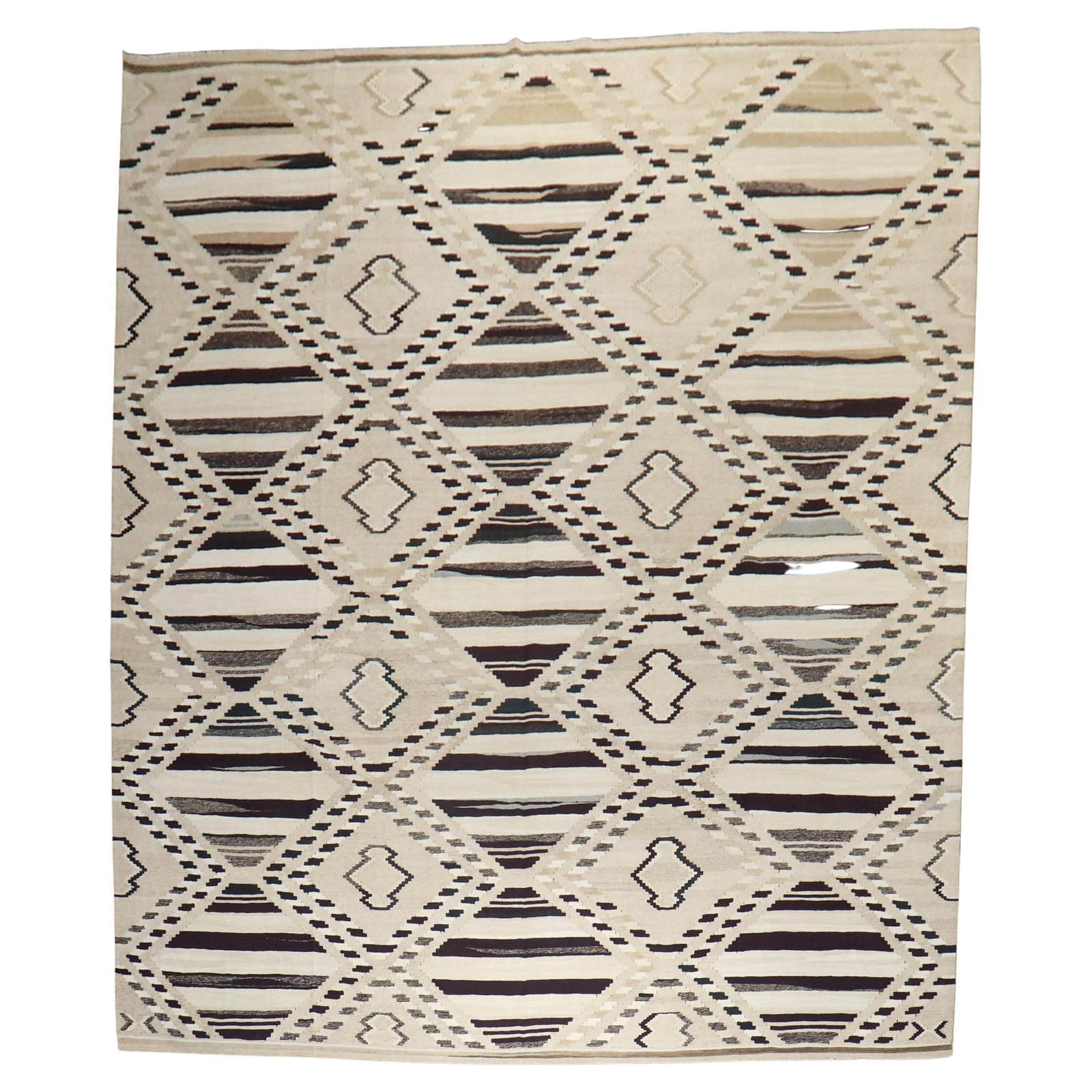 10'1" x 14' Turkish Wool Geometric Kilim Rug Mid-Century Modern: 10'1" x 14' Turkish Wool Geometric Kilim Rug Mid-Century Modern This is a mid-century modern Turkish kilim rug from the late 20th century, featuring geometric patterns in brown, ivory, and camel tones