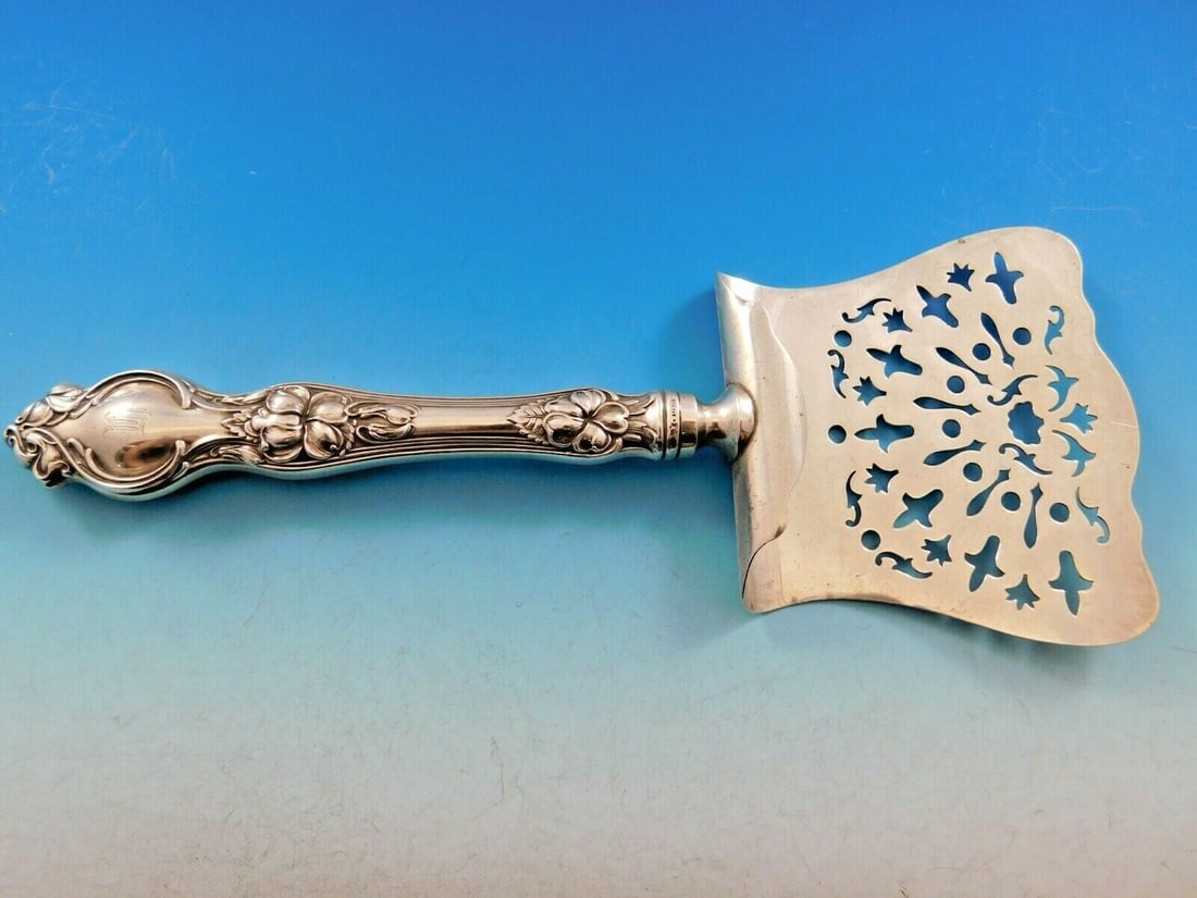 Wallace Violet Sterling Silver Hooded Asparagus Server 10 Inch: Wallace Violet Sterling Silver Hooded Asparagus Server 10 Inch Discover the elegance of the Violet by Wallace Sterling Silver Asparagus Server. This exquisite serving piece, measuring 10 inches, featu