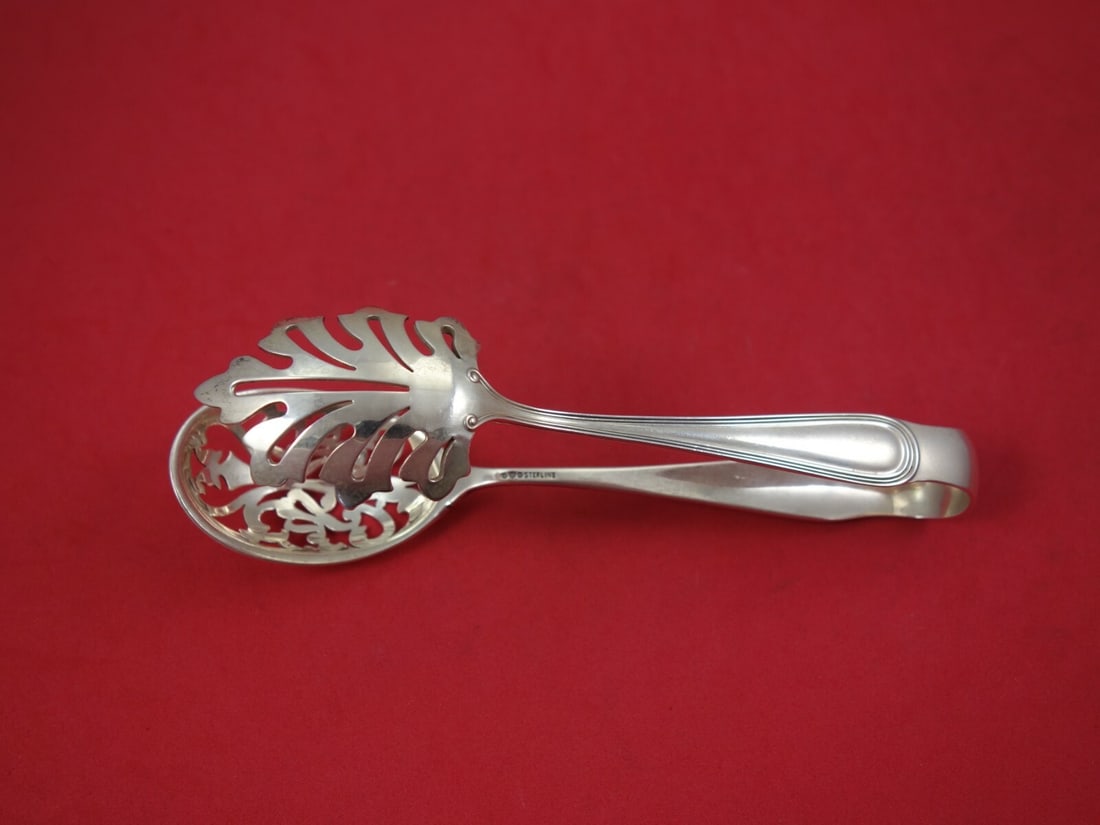 Watson Commonwealth Sterling Silver Ice Tong and Spoon Set 6.5": Watson Commonwealth Sterling Silver Ice Tong and Spoon Set 6.5" Add elegance to your serving collection with this exquisite Commonwealth by Watson Sterling Silver Ice Tong and Pierced Spoon set. Measu