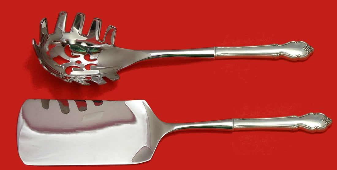 International Sterling Silver Breton Rose 2pc Pasta Hostess Set: International Sterling Silver Breton Rose 2pc Pasta Hostess Set Elevate your dining experience with this exquisite Breton Rose Hostess Set by International Sterling. Crafted from sterling silver, this