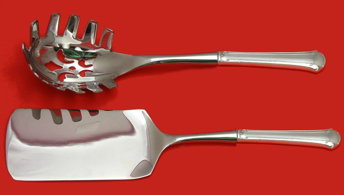 Towle Chippendale Sterling Silver 2pc Pasta Server Set Custom: Towle Chippendale Sterling Silver 2pc Pasta Server Set Custom Experience elegance with the Chippendale by Towle Sterling Silver Italian Pasta Server Set. This exquisite 2-piece hostess set showcases a