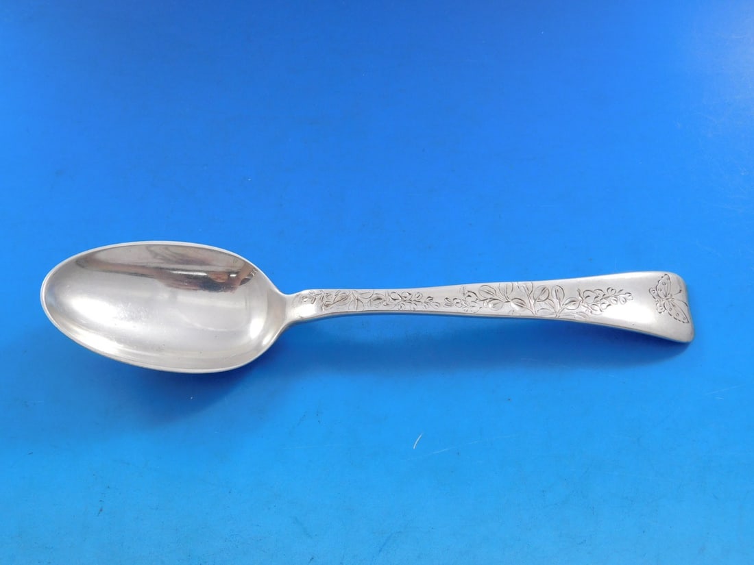 Tiffany Sterling Silver 7 Inch Lap Over Edge Soup Spoon with Butterfly Design: Tiffany Sterling Silver 7 Inch Lap Over Edge Soup Spoon with Butterfly Design This exquisite place soup spoon features the elegant Lap Over Edge pattern by Tiffany & Co., crafted from high-quality ste