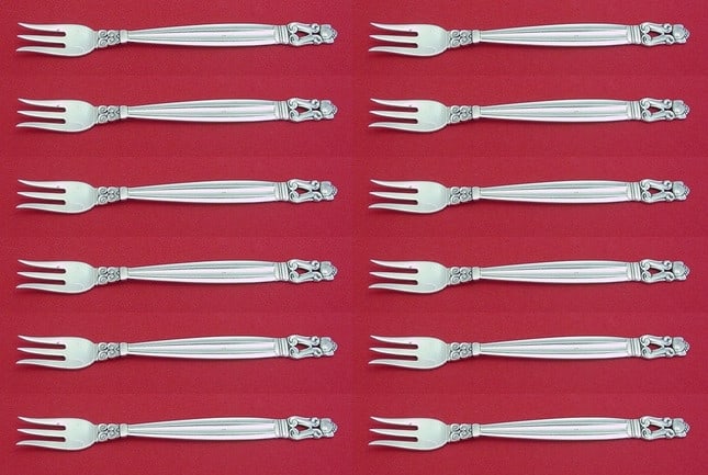 Georg Jensen Acorn Sterling Silver Cocktail Fork Set 12 pcs 5 3/4": Georg Jensen Acorn Sterling Silver Cocktail Fork Set 12 pcs 5 3/4" Enhance your dining experience with this exquisite 12-piece cocktail fork set from the renowned Georg Jensen, featuring the elegant A