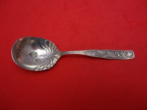 Towle Orchids sterling silver preserve spoon with brite cut bowl flowers: Towle Orchids sterling silver preserve spoon with brite cut bowl flowers A Towle sterling silver preserve spoon in the Orchids pattern, featuring brite cut flowers in the bowl. It is not monogrammed a