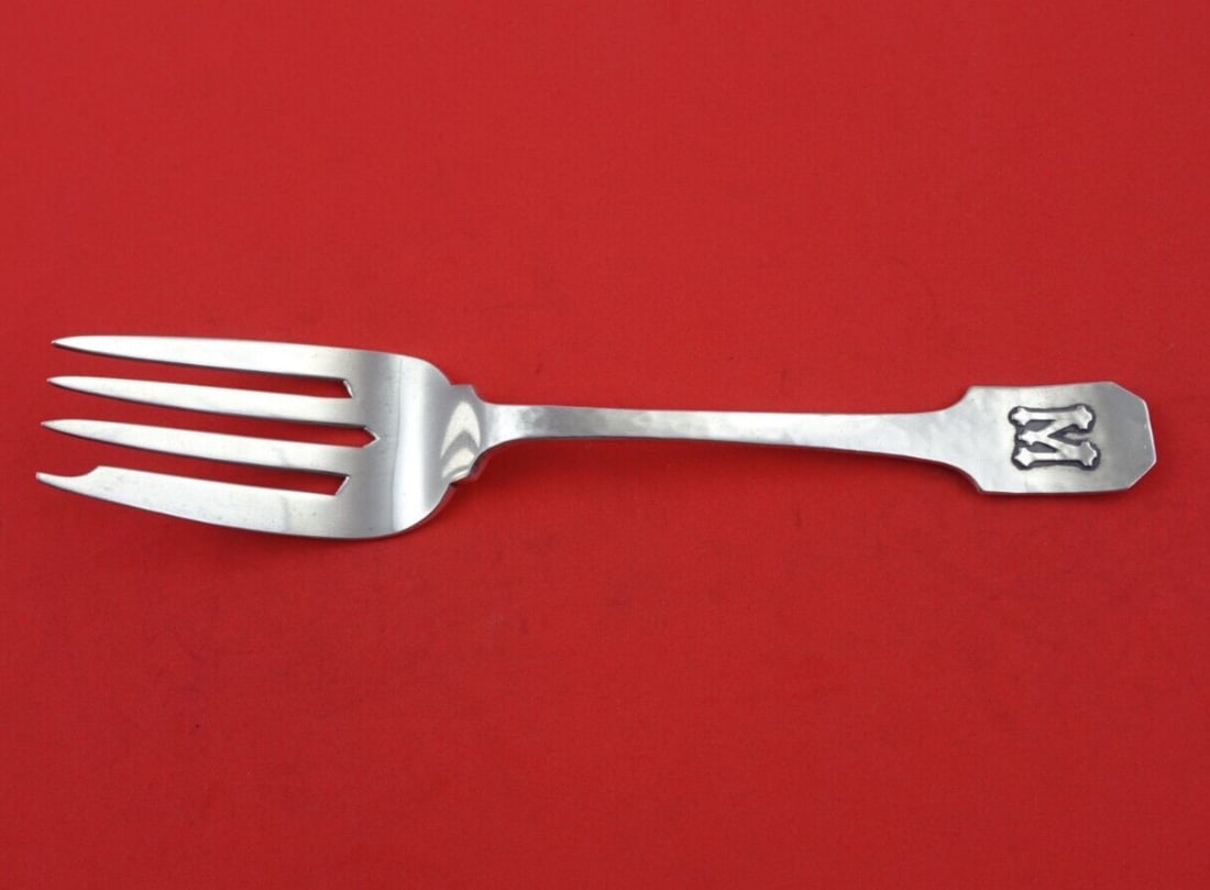 Shreve Norman Hammered Sterling Silver Serving Fork Applied Mono M 7 1/2": Shreve Norman Hammered Sterling Silver Serving Fork Applied Mono M 7 1/2" Sterling silver cold meat fork in the Norman Hammered pattern by Shreve. It features an applied monogram M and measures 7 1/2 