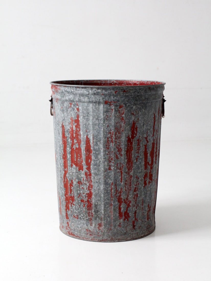 Galvanized Utility Can with Red Paint Early 20th Century: Galvanized Utility Can with Red Paint Early 20th Century Early 20th century galvanized utility can with remnants of red paint, original drop-ring handles, and a weathered surface. Its tall cylindrical