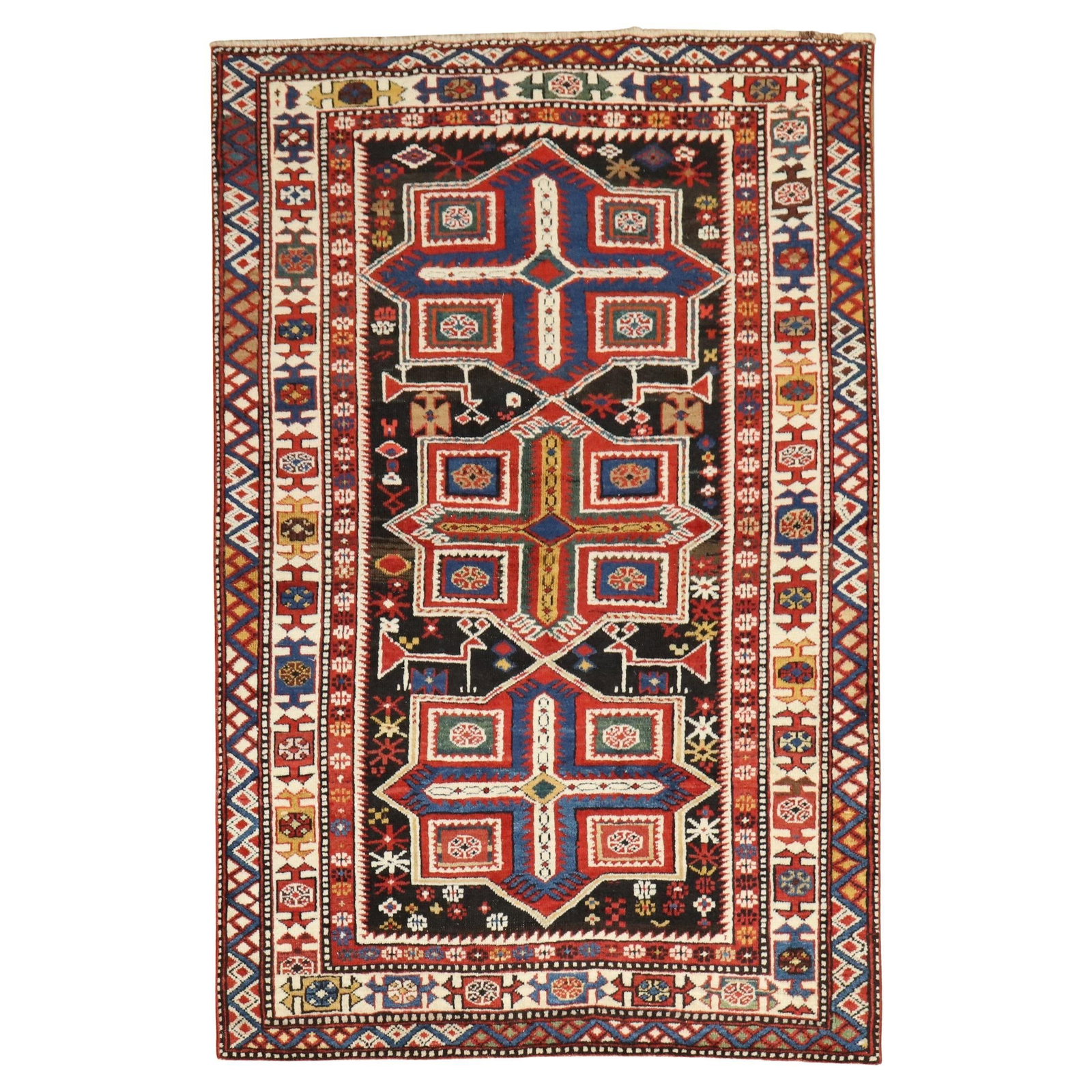 19th Century Kazak Shirvan Hand-Knotted Wool Rug 40 x 64: 19th Century Kazak Shirvan Hand-Knotted Wool Rug 40 x 64 Discover the beauty of this late 19th Century Antique Shirvan Rug from the renowned Kazak style. Hand-knotted with high-quality wool, this rug 