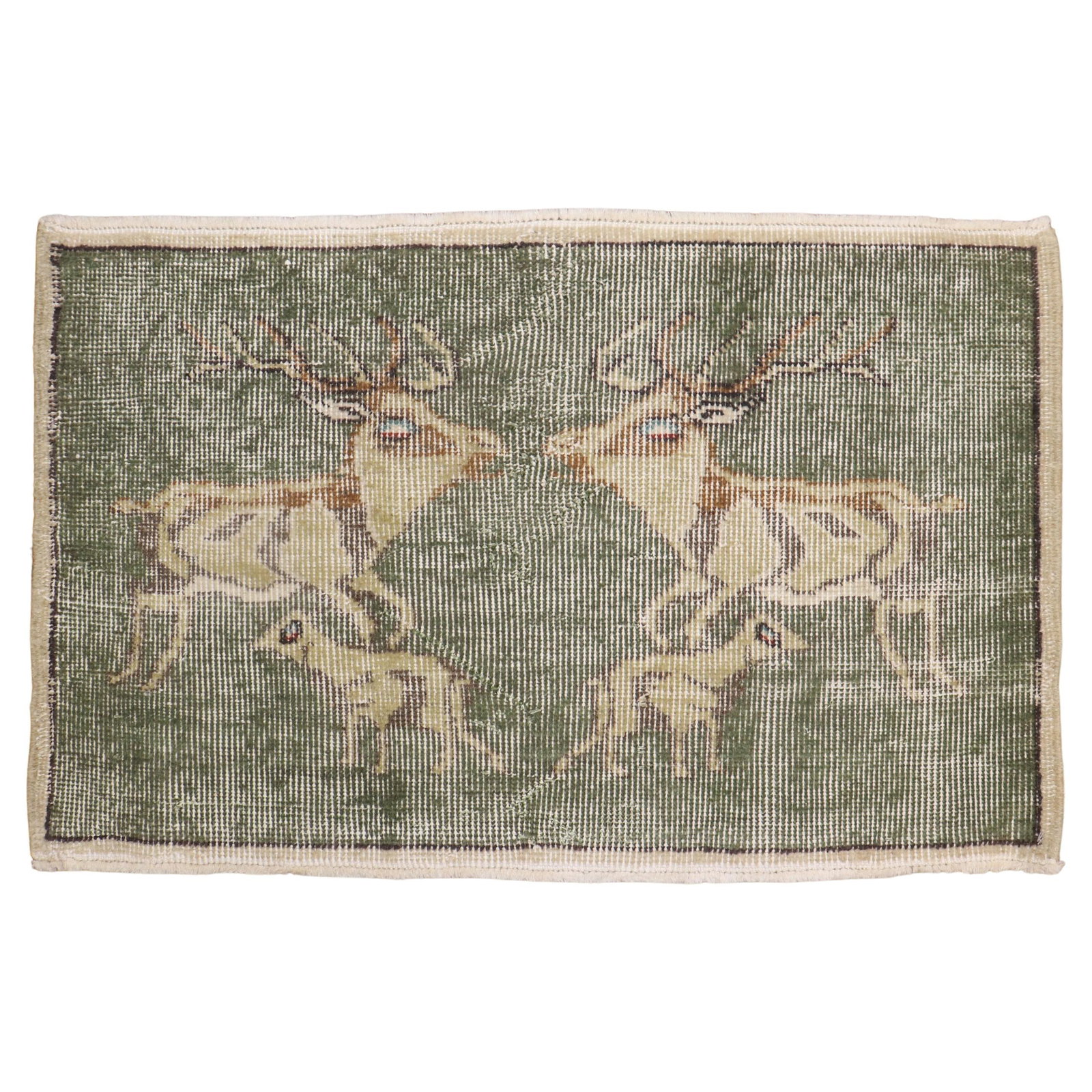 Mid-20th Century Hand-Woven Green Turkish Deer Rug: Mid-20th Century Hand-Woven Green Turkish Deer Rug Add a touch of unique artistry to your space with this one-of-a-kind hand-knotted Green Turkish Deco Deer Rug. This charming folk art piece features 