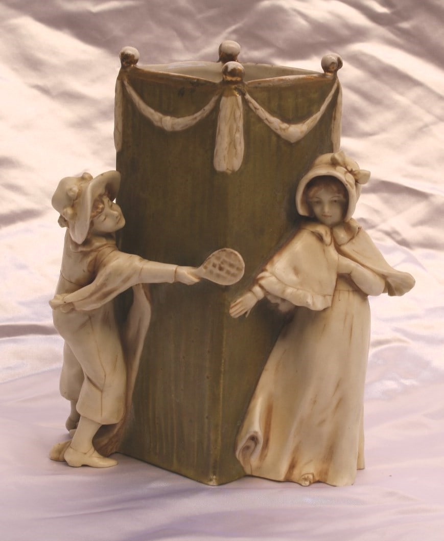 1900 Signed Amphora Vase Charming Boy Girl Scene: 1900 Signed Amphora Vase Charming Boy Girl Scene Presenting a stunning 1900 Amphora vase, fully signed and hallmarked on the base. This exquisite piece showcases a charming scene of a boy and girl pla