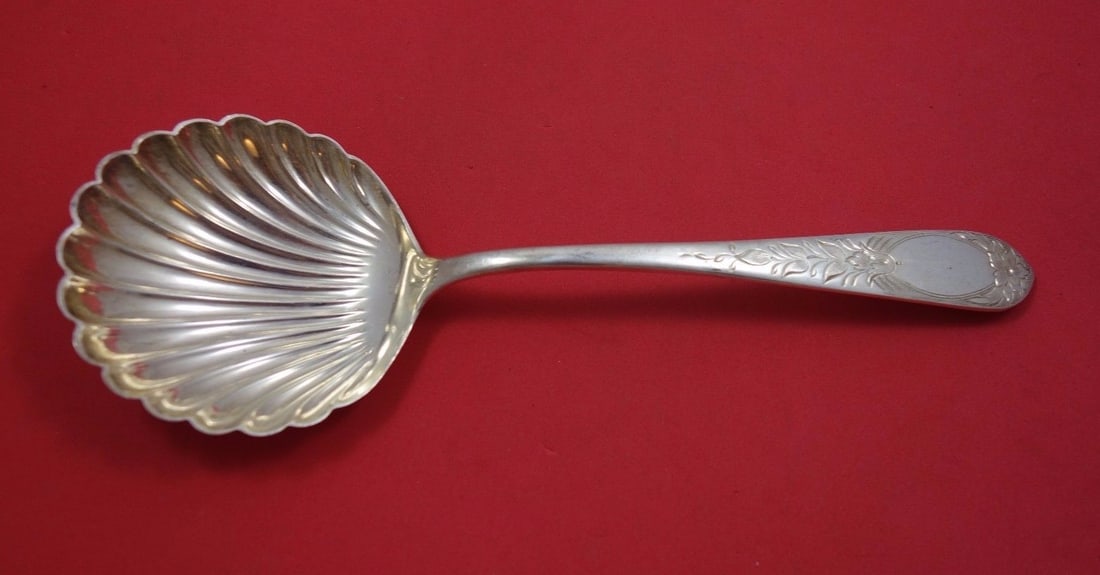 Kirk Primrose Sterling Silver Berry Spoon Shell Bowl 9 1/8": Kirk Primrose Sterling Silver Berry Spoon Shell Bowl 9 1/8" This exquisite serving spoon, part of the Primrose pattern by Kirk, showcases a beautiful shell bowl design. Made of high-quality sterling s