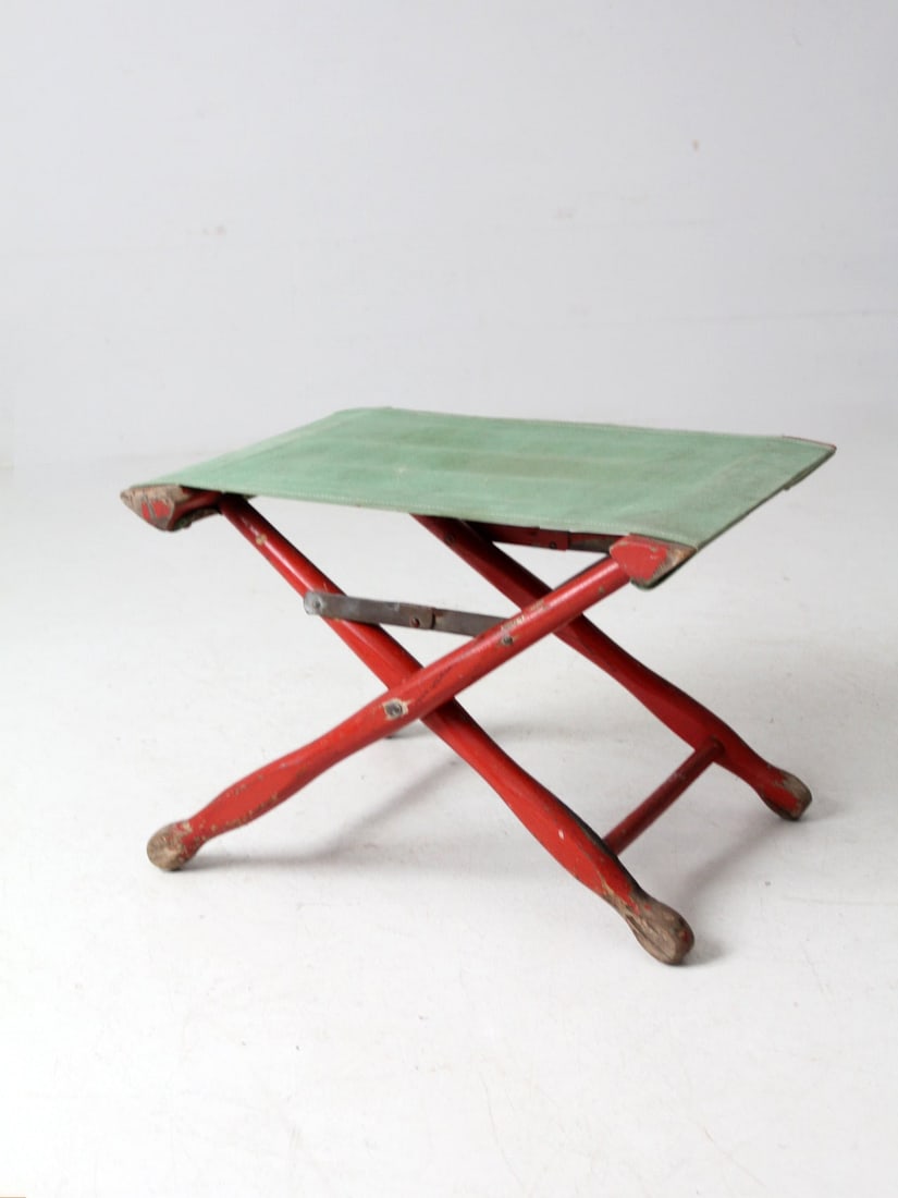 Mid-Century Folding X-Frame Camp Stool Red Green Canvas: Mid-Century Folding X-Frame Camp Stool Red Green Canvas This vintage folding camp stool features an eye-catching red-painted wooden x-frame paired with a green canvas seat, making it a stylish and pra