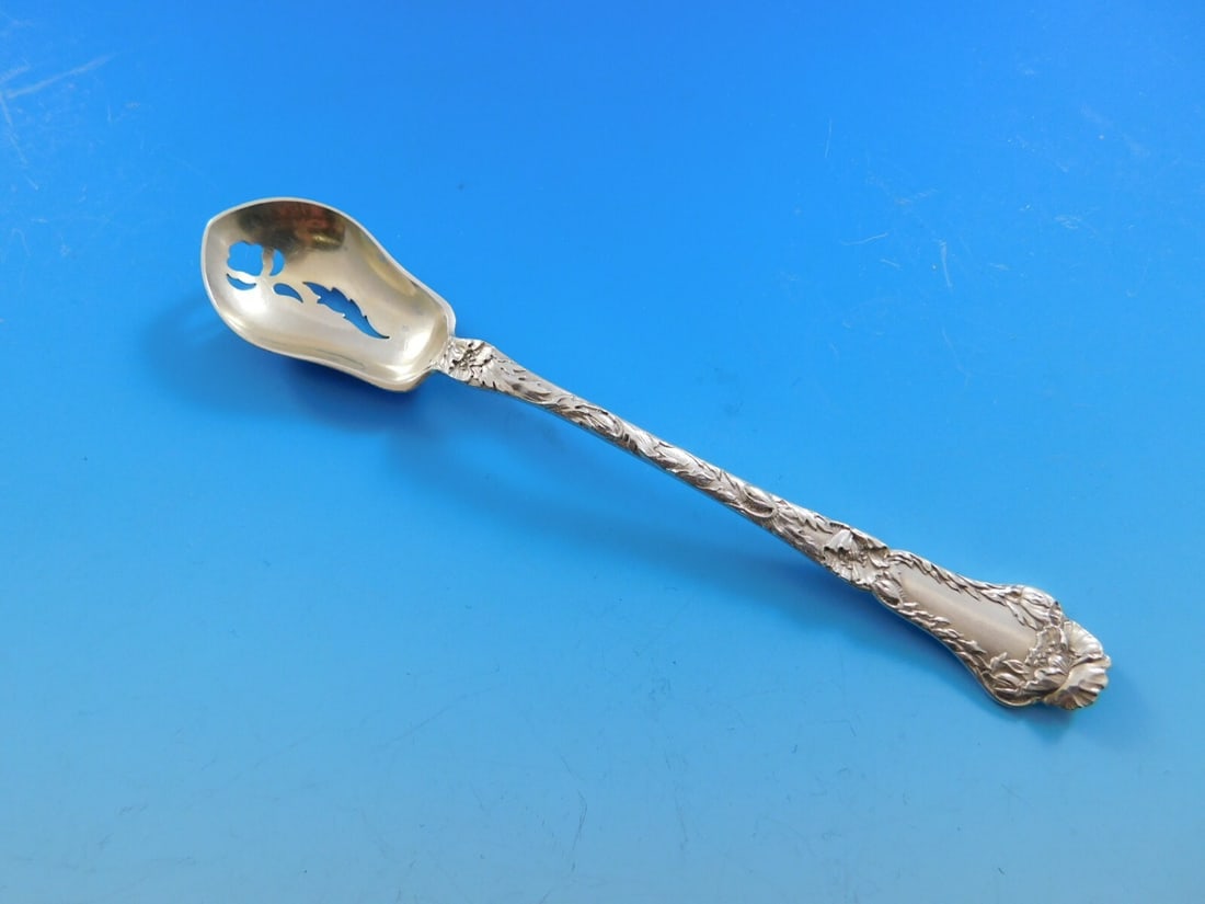 Gorham Poppy Sterling Silver Olive Spoon Gold-Washed 5 3/4 Inch: Gorham Poppy Sterling Silver Olive Spoon Gold-Washed 5 3/4 Inch This exquisite serving spoon is part of the Poppy pattern by Gorham, crafted from high-quality sterling silver. Featuring a beautifully 
