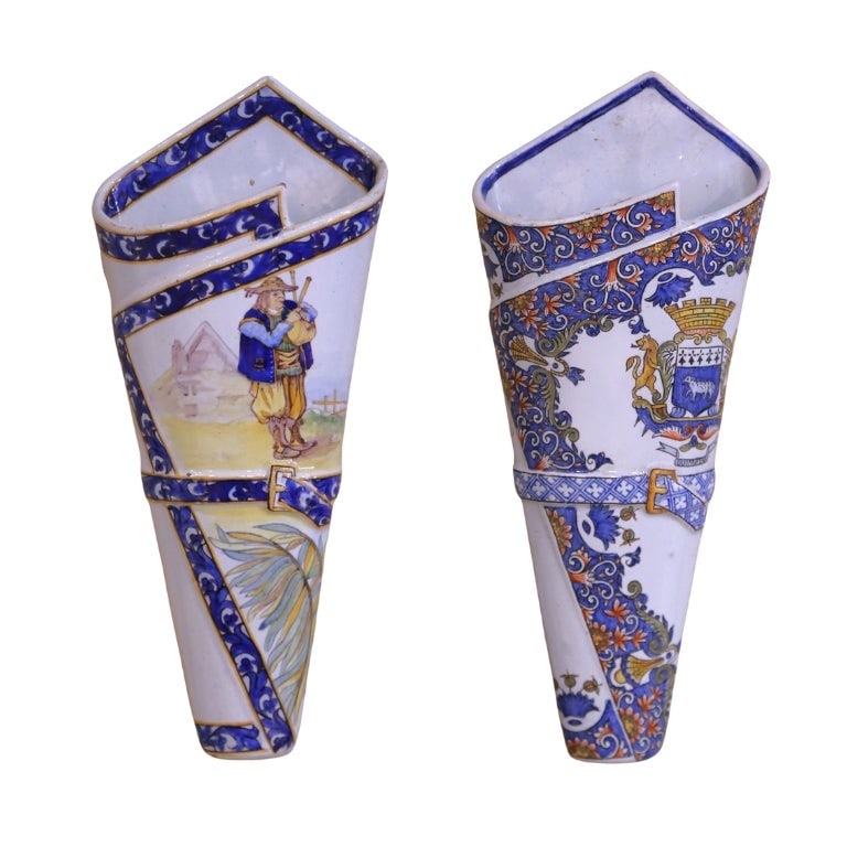Antique Pair of 19th Century Porquier-Beau Quimper Faience Wall Vases: Antique Pair of 19th Century Porquier-Beau Quimper Faience Wall Vases Enhance your home decor with this exquisite pair of 19th Century French Porquier-Beau Quimper faience wall vases. Crafted in Britt