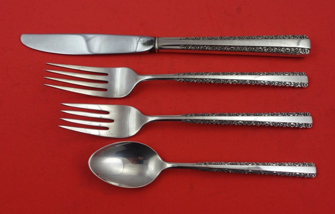 International Sterling Silver Romance 4-Piece Place Setting: International Sterling Silver Romance 4-Piece Place Setting Enhance your dining experience with this elegant 4-piece place setting in the Romance pattern by International Sterling. Crafted from high-q
