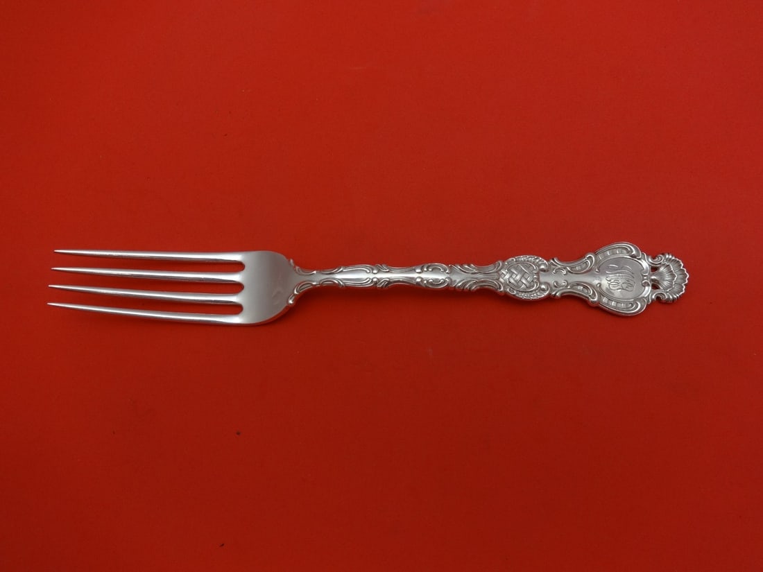 Durgin Regent Sterling Silver Dinner Fork Monogrammed 7 3/4": Durgin Regent Sterling Silver Dinner Fork Monogrammed 7 3/4" This elegant dinner fork features the classic Regent pattern by Durgin, crafted from high-quality sterling silver. Measuring 7 3/4 inches, 