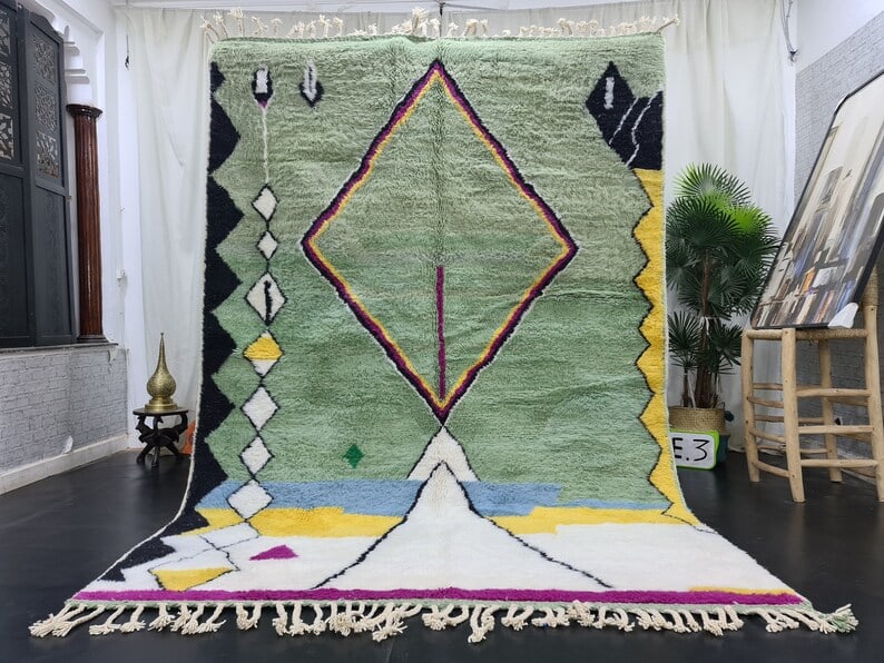Authentic Handwoven Moroccan Rug 100% Sheep Wool 8 x 5 Feet: Authentic Handwoven Moroccan Rug 100% Sheep Wool 8 x 5 Feet Enhance your space with this stunning authentic rug, handwoven in the Atlas Mountains by local Berber women weavers. Crafted using tradition