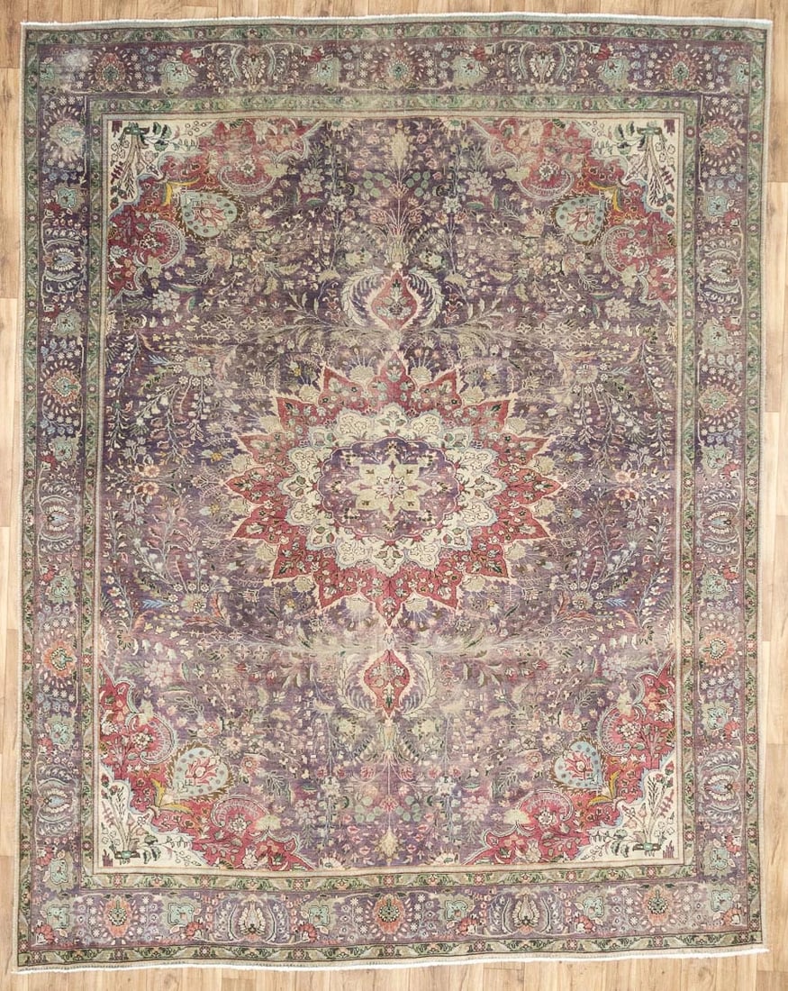 Handmade Wool Floral Oriental Area Rug 9'9 x 12'5: Handmade Wool Floral Oriental Area Rug 9'9 x 12'5 This semi-antique handmade oriental rug features a traditional floral pattern in muted tones of purple, cream, light green, and light blue. Expertly h