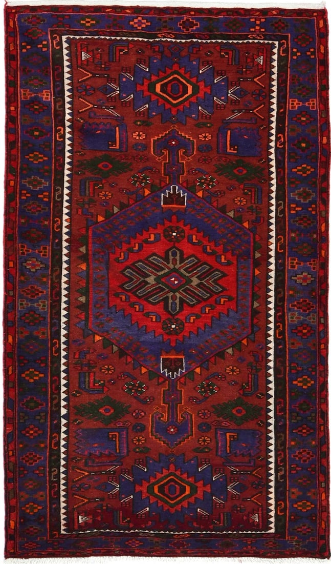 Vintage Tribal Handmade Wool Oriental Rug 3'9 X 6'7: Vintage Tribal Handmade Wool Oriental Rug 3'9 X 6'7 This vintage tribal oriental rug is a handmade, hand-knotted wool piece from Western Asia, dating to the 1980s. Featuring a geometric pattern in ric
