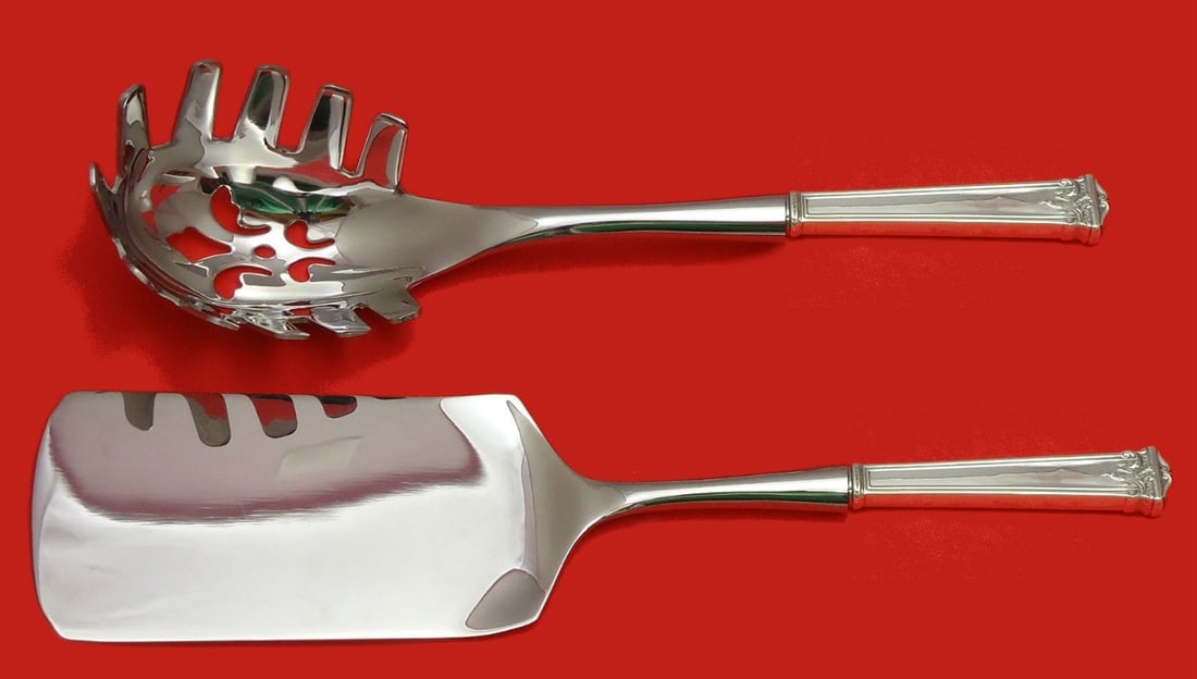 Trianon Sterling Silver Hostess Set 2pc by International: Trianon Sterling Silver Hostess Set 2pc by International Elevate your dining experience with this exquisite Trianon Hostess Set by International Sterling. Crafted from sterling silver, this two-piece 