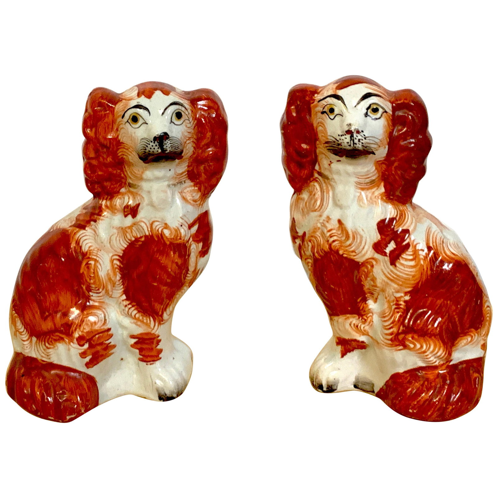 Set of 2 Red Staffordshire Spaniels High Victorian 1860s: Set of 2 Red Staffordshire Spaniels High Victorian 1860s This charming pair of diminutive red Staffordshire spaniels, dating back to circa 1860, showcases exquisite hand-painted details and expressive