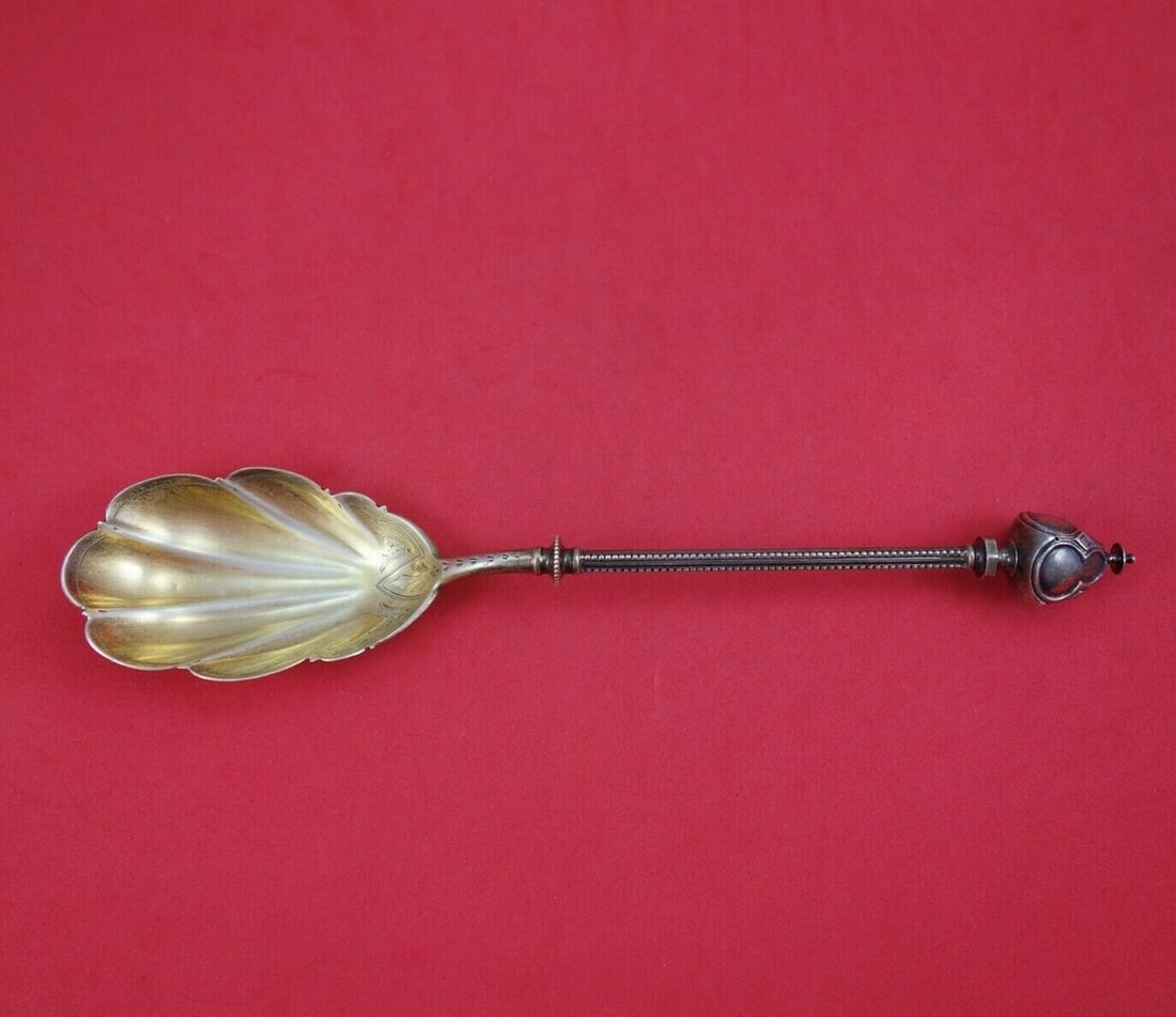 George Sharp Gothic Dome Sterling Silver Berry Spoon 9 1/4": George Sharp Gothic Dome Sterling Silver Berry Spoon 9 1/4" This exquisite Gothic Dome serving spoon, crafted by George Sharp, is a stunning addition to any silverware collection. Made of high-quality