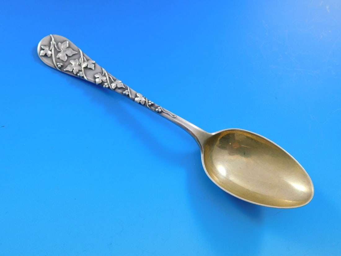 Tiffany & Co Lap Over Edge Sterling Silver Teaspoon with Gold Bowl: Tiffany & Co Lap Over Edge Sterling Silver Teaspoon with Gold Bowl This exquisite Tiffany & Co. sterling silver teaspoon features the classic Lap Over Edge pattern, dating back to 1850-1899. The spoon