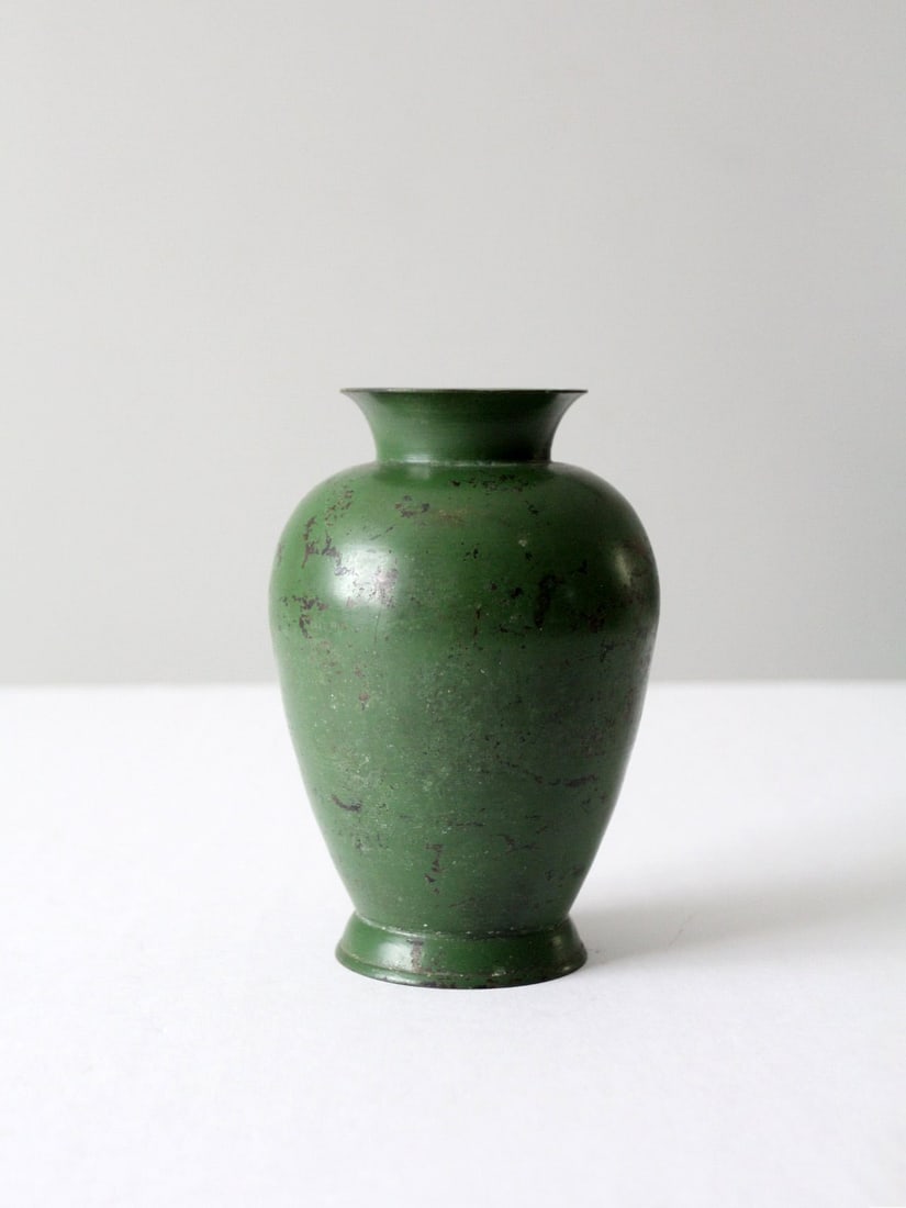 Vintage 1920-1940 Jade Green Enamel Metal Vase: Vintage 1920-1940 Jade Green Enamel Metal Vase This vintage enamel painted metal vase, dating from 1920 to 1940, showcases a stunning jade green color complemented by natural distressing, creating a b