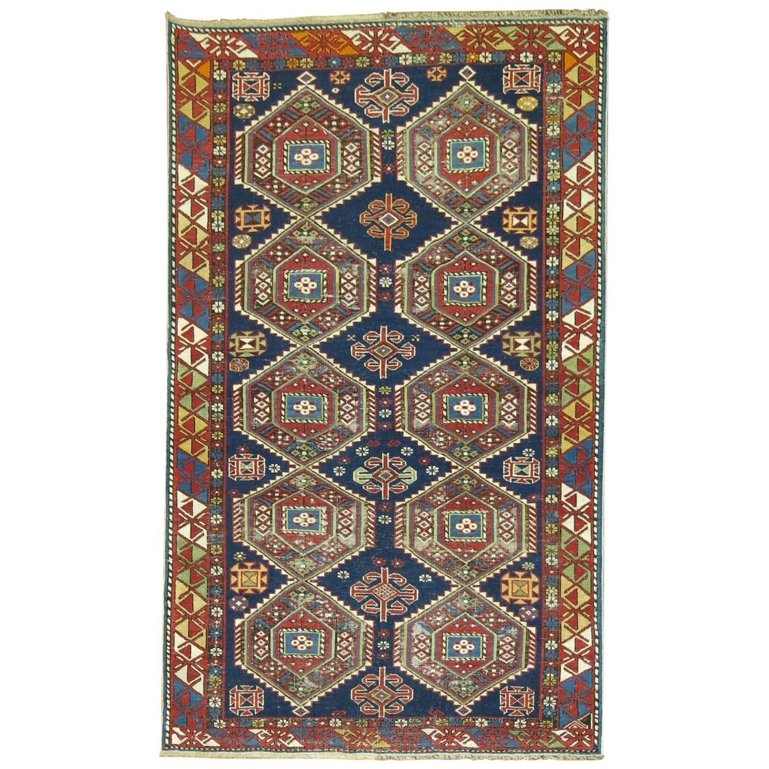 Early 20th Century Wool Hand Knotted Shirvan Rug 40 x 62 in: Early 20th Century Wool Hand Knotted Shirvan Rug 40 x 62 in This finely woven antique Shirvan rug from the Caucasus dates to the early 20th century, circa 1910. Showcasing jewel-toned colors and a tra