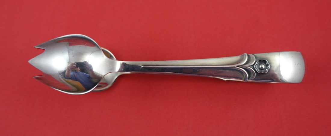 Cohr Sterling Silver Ice Tong 7" with Flower Design: Cohr Sterling Silver Ice Tong 7" with Flower Design This exquisite ice tong is crafted from sterling silver by Cohr, featuring an elegant design with applied flowers. Measuring 7 inches, it is a beaut