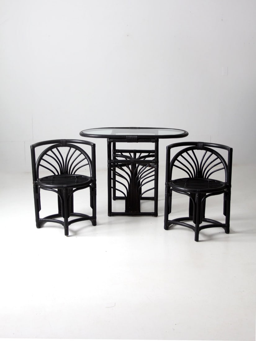 Mid-Century Black Rattan Dining Set with Glass Table and 2 Chairs: Mid-Century Black Rattan Dining Set with Glass Table and 2 Chairs Elevate your dining experience with this Mid-Century Black Rattan Dining Set, perfectly designed for smaller spaces. The sleek and sty