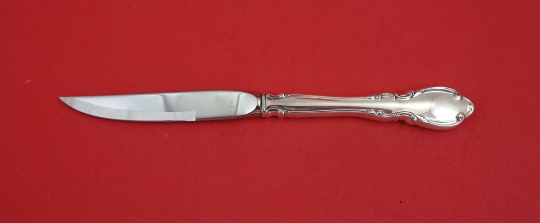Sterling Silver Steak Knife Legato Pattern 9 Inch Hollow Handle: Sterling Silver Steak Knife Legato Pattern 9 Inch Hollow Handle This Legato by Towle steak knife features a sterling silver original hollow handle and a stainless steel beveled blade. Crafted in the U