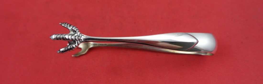 Dominick & Haff Pointed Antique Sterling Silver Sugar Tong 4 3/4": Dominick & Haff Pointed Antique Sterling Silver Sugar Tong 4 3/4" Discover a stunning piece of history with this large Sterling Silver Sugar Tong from the esteemed Dominick & Haff, crafted in the eleg
