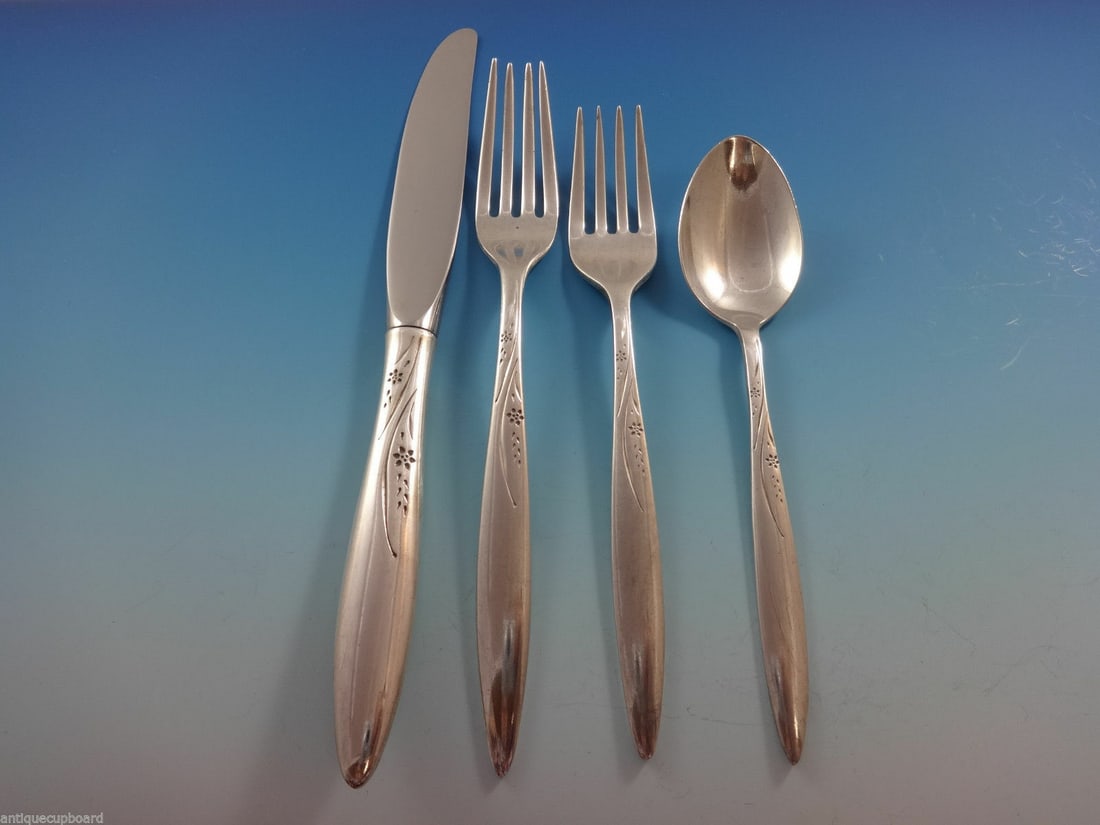 Easterling Helene Sterling Silver 4-Piece Place Setting: Easterling Helene Sterling Silver 4-Piece Place Setting This 4-piece place setting features the elegant Helene pattern by Easterling, crafted from high-quality sterling silver. The set includes a regu