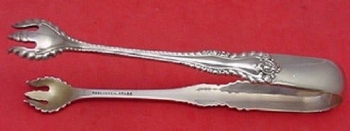 Dominick Haff Mazarin sterling silver sugar tong 5 inch: Dominick Haff Mazarin sterling silver sugar tong 5 inch This exquisite Mazarin sugar tong, crafted by Dominick & Haff, showcases the elegance of sterling silver design from the late 19th century. Meas