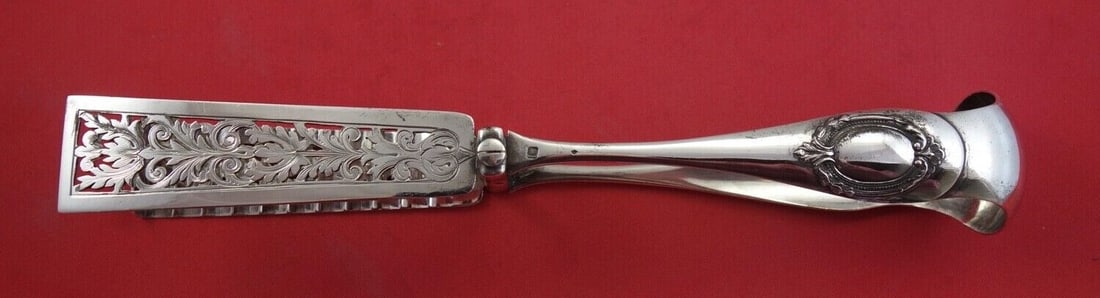 French 950 Sterling Silver Asparagus Serving Tong 10 Inch Pierced Design: French 950 Sterling Silver Asparagus Serving Tong 10 Inch Pierced Design This exquisite French asparagus serving tong is crafted from 950 sterling silver, featuring a unique yoked pierced design and b