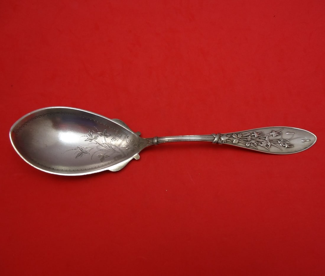 Sterling Silver Bright Cut Berry Spoon Honeysuckle Pattern 9 Inch: Sterling Silver Bright Cut Berry Spoon Honeysuckle Pattern 9 Inch This is a sterling silver berry serving spoon in the Honeysuckle pattern by Whiting, featuring a bright-cut design. The spoon measures