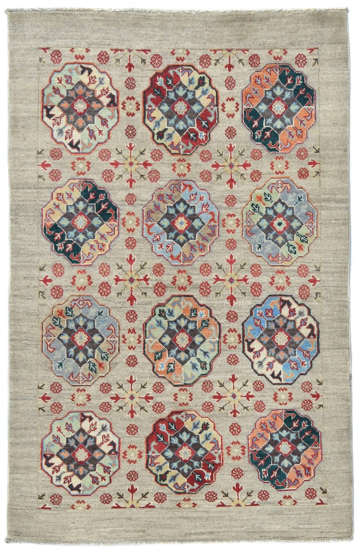 Handmade Wool Kazak Floral Area Rug 3'7 x 5'10: Handmade Wool Kazak Floral Area Rug 3'7 x 5'10 This handmade Kazak rug from Pakistan features a modern floral pattern in a blend of beige, red, brown, peach, light gray, and light blue tones. Expertly