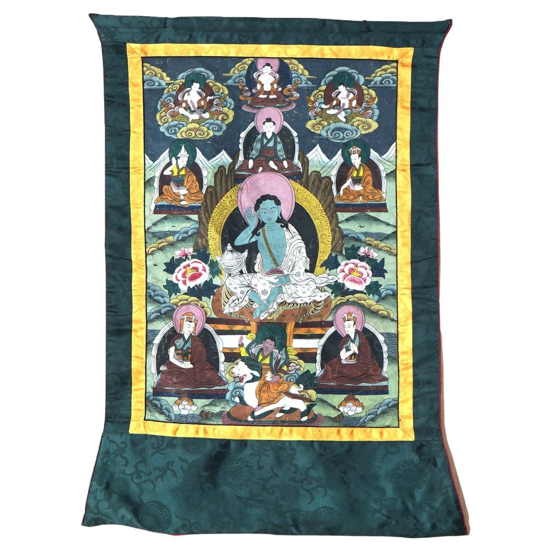 Hand-Painted Early 20th C Tibetan Thangka on Silk and Canvas with Figures: Hand-Painted Early 20th C Tibetan Thangka on Silk and Canvas with Figures This antique Tibetan Thangka, dating to circa 1920, is a hand-painted work of Buddhist art created on silk and canvas. The pie