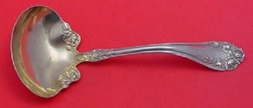 Wallace Rose Sterling Silver Gravy Ladle Goldwashed 1850-1899: Wallace Rose Sterling Silver Gravy Ladle Goldwashed 1850-1899 This exquisite gravy ladle from the renowned Rose pattern by Wallace dates back to 1850-1899. Crafted from high-quality sterling silver an