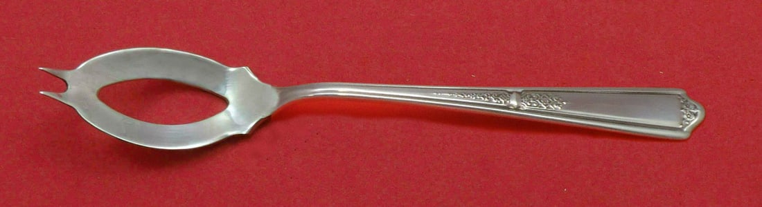 Towle Seville Sterling Silver Olive Serving Spoon 5 3/4 Custom Made: Towle Seville Sterling Silver Olive Serving Spoon 5 3/4 Custom Made A custom-made Ideal olive spoon in the Seville pattern by Towle, crafted in sterling silver. This serving piece is post-1940, made i