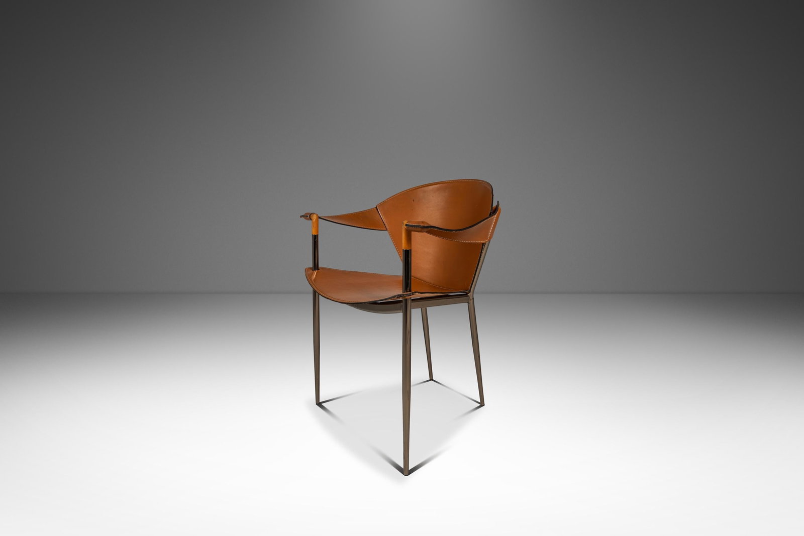 Arrben Jocauro Leather Armchair with Chrome Legs Italy 1990s: Arrben Jocauro Leather Armchair with Chrome Legs Italy 1990s Italian postmodern modernist "Jocauro" armchair by Arrben, made in Italy circa the 1990s. It features a contoured leather seat and back, sl