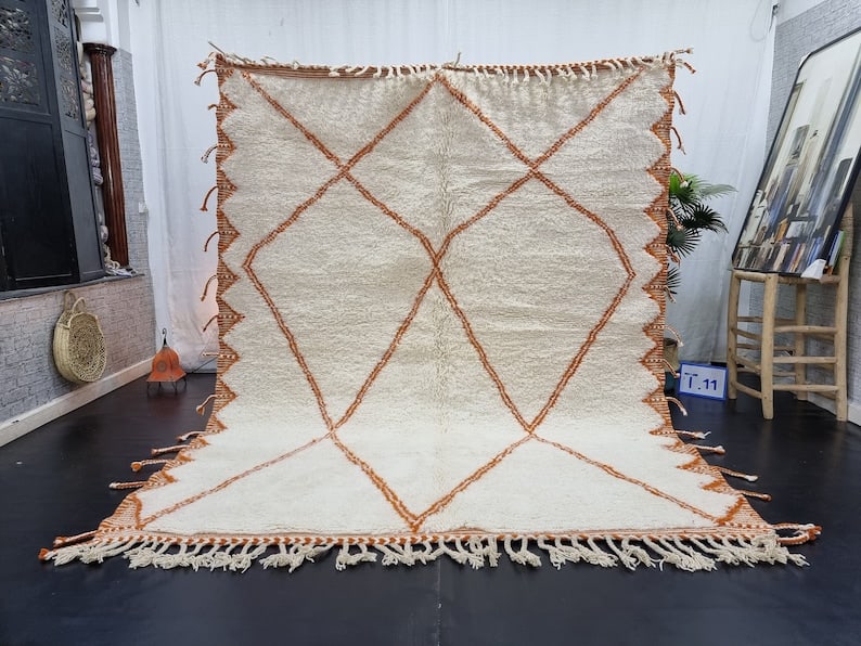 Authentic White Engraved Rug Handwoven in Morocco 6.56 x 5 Feet: Authentic White Engraved Rug Handwoven in Morocco 6.56 x 5 Feet Transform your space with this stunning White Authentic Engraved Rug, handwoven in the Atlas Mountains by skilled Berber women weavers. 