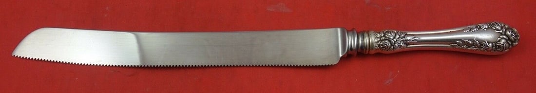 Wallace Rose Sterling Silver Custom Wedding Cake Knife 12 1/4 inches: Wallace Rose Sterling Silver Custom Wedding Cake Knife 12 1/4 inches This exquisite wedding cake knife features a hollow handle crafted from sterling silver in the elegant 'Rose' pattern by Wallace, d