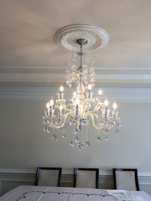 Artistry Elizabeth Chrome K9 Crystal 12-Light Chandelier: Artistry Elizabeth Chrome K9 Crystal 12-Light Chandelier This modern crystal chandelier features a chrome finish and is part of the Elizabeth Collection. Designed in the Venetian style, it showcases h