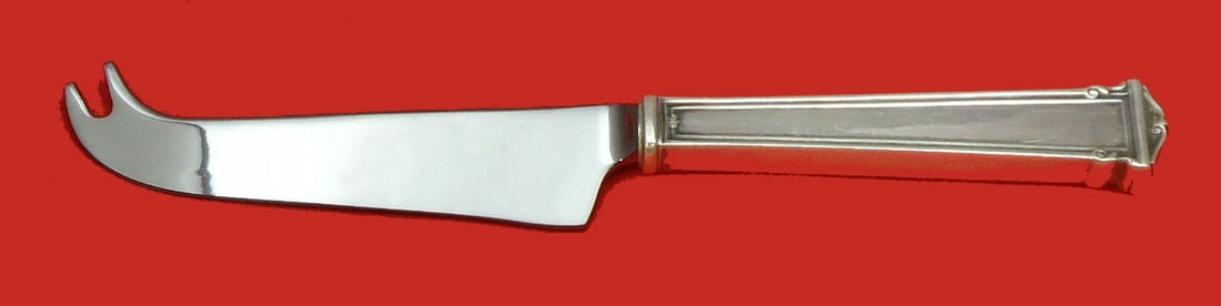 Theseum Sterling Silver Cheese Knife by International 8 1/4 Custom Hollow Handle: Theseum Sterling Silver Cheese Knife by International 8 1/4 Custom Hollow Handle This exquisite cheese knife from the Theseum pattern by International is meticulously crafted from sterling silver, fea